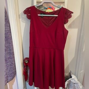 Short red dress with lace cap sleeves